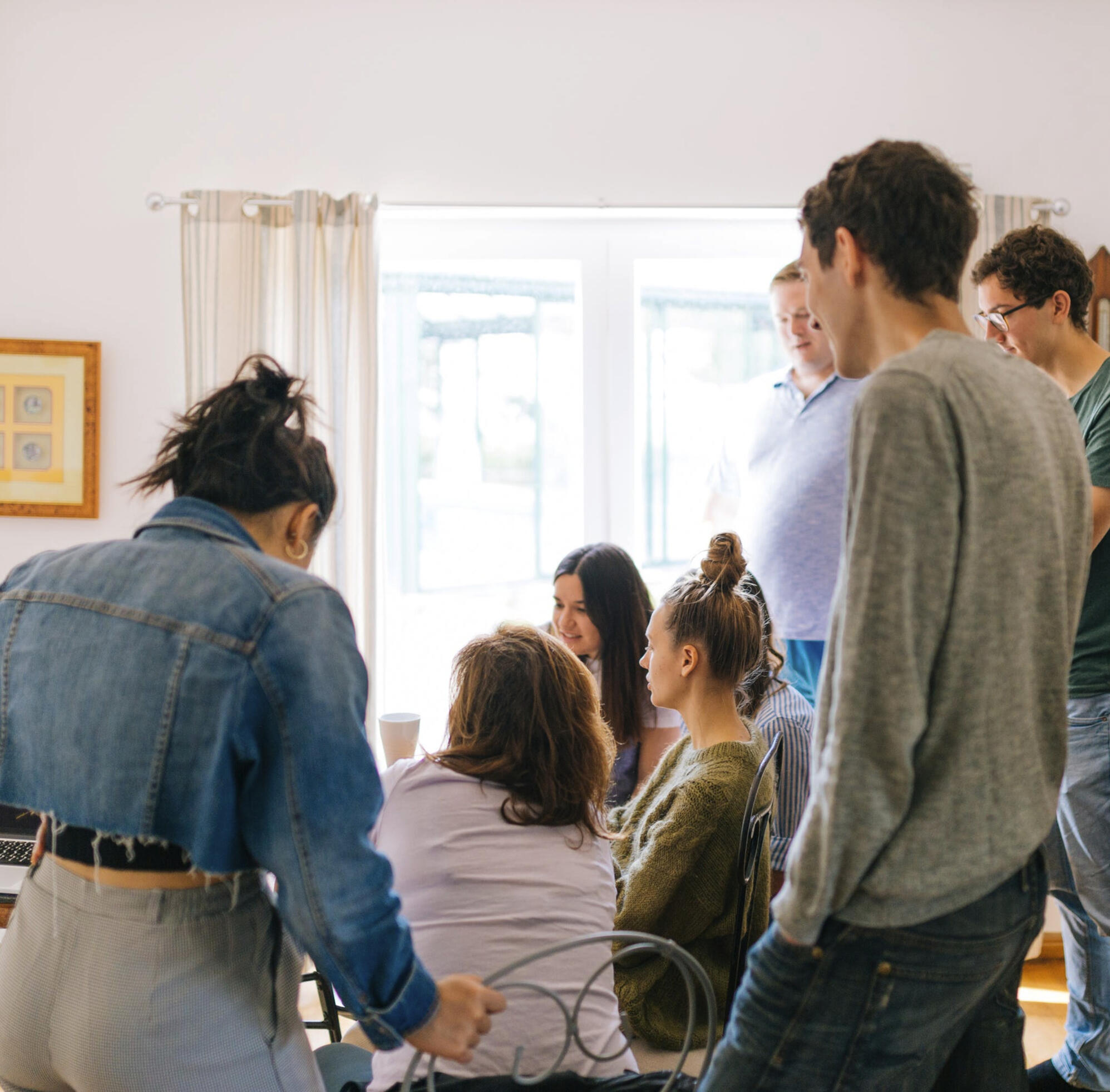 Gathering of a couple of people in a room